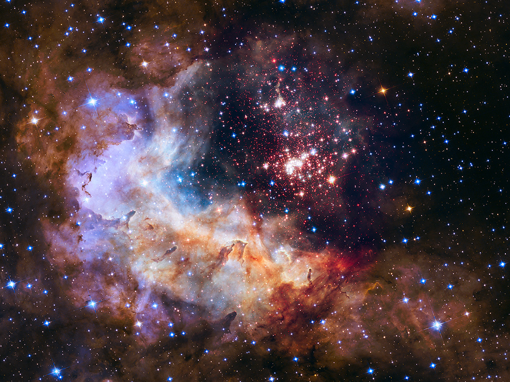 Example of a star-forming region with a young star cluster: Westerlund 2, aged 1-2 million years, located in the constellation Carina.